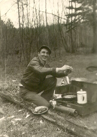 Raymond C. Brokaw
A special picture of Dad. 
Keywords: camp,cook,dad,stove,outdoor