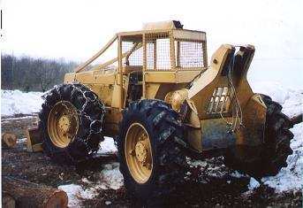 small_timberjack_cable_skidder
Parked At Landing. Osterlund Road timber harvest; 3/05
