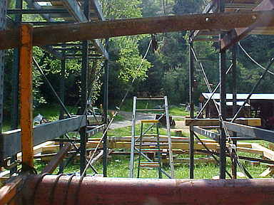 bent2wheel
shot looking over the windlass at the gin pole and then the truss laying down. The handle of the windlass is locked by the upper bar right now, it swings up out of the way.

