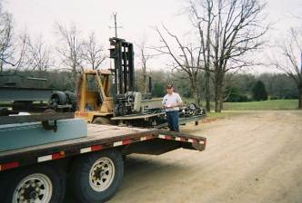 Dad and Best Enterprises Forklift with one of the polishers
