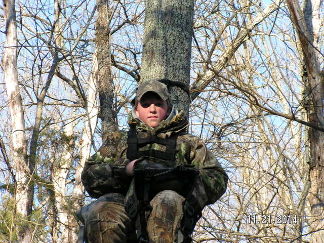 Little Tom  (13)
Sitting in his deer stand .
