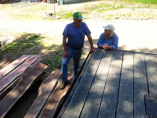Customer Larry - May 2012
Larry and Mary talking over what he may make out of the walnut flitces we sawed out of an â€œirregularâ€ shaped log.  He was excited but said he was going to sleep on it a while before coming up with the right use for it.
