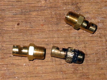 Lube-Mizer nozel - 2008 Jan
I managed to round off the shoulders on the nozzles used on the Lube-Mizer system.  

I learned two things in the process.  1) They don’t need to be so tight.  I screw them in to finger tight then turn until the hole lines up to spray on the blade. 2) If there is any major work need on the new super guides,  it’s best to just take them off and work on them in a bench vice.  

Keywords: Lube-Mizer