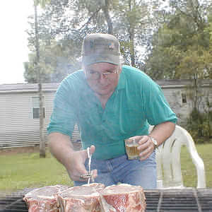 Charlie cookin' small steaks at Tom's house

