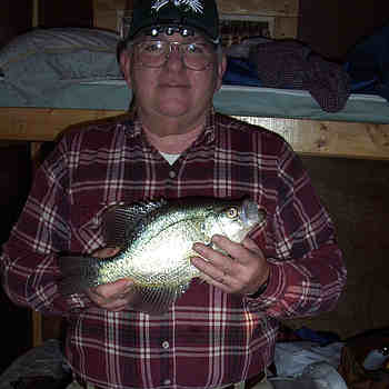 Charlie and one of his slab crappies.
Charlie and one of his slab crappies.
