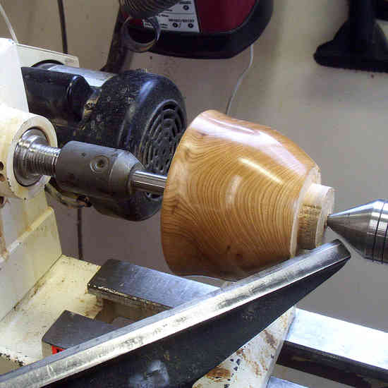 Figure 3: Tutorial â€“ Finishing the bottom of a bowl
This is one of 6 pictures used in my tutorial on how I finish turning the bottom of my bowls.  This technique can also be applied to finishing the bottoms of turned lidded boxes. The Tutorial can be found on the General Woodworking Board.
