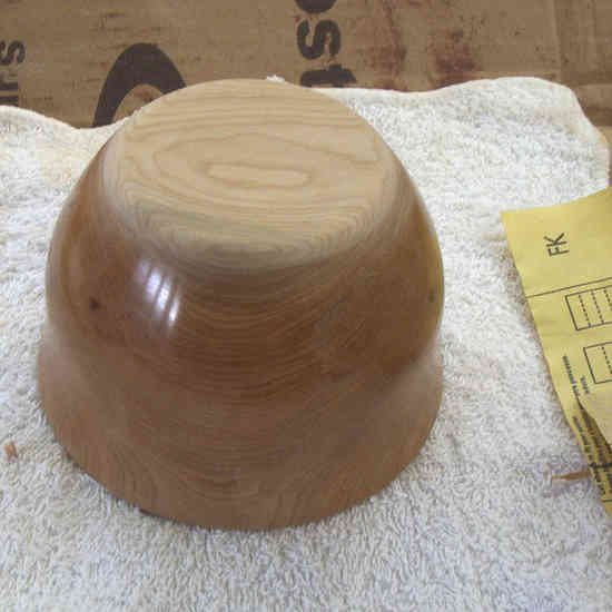 Figure 6: Tutorial â€“ Finishing the bottom of a bowl
This is one of 6 pictures used in my tutorial on how I finish turning the bottom of my bowls.  This technique can also be applied to finishing the bottoms of turned lidded boxes. The Tutorial can be found on the General Woodworking Board.
