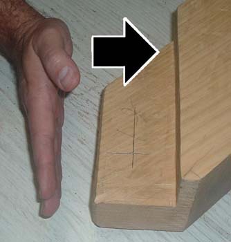 Hand showing second timber movement for understanding offset location for draw boring.
