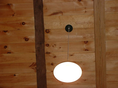 Electric light in restored barn
