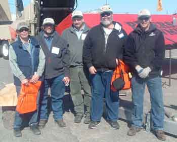 "Some" of the many FF members at the Bangor, ME, equipment show.....
From left to right: SpruceBunny, Marcel "isawlogs", Kevin"neslrite" of LogRite tools, Jim_Rogers, and "Captain" Craig Blake.
