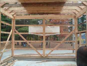 Photo of rear wall bracing.
This photo shows the bracing on the rear wall of the pole barn. This bracing helps to make the building stable in the wind.
