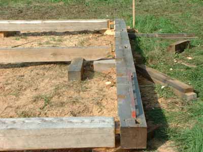Connecting a long sill to two cross sills and a tying joist.
