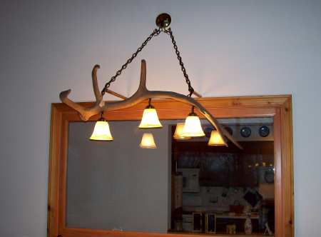 ElkAntlerLamp
Hung up the new elk antler lamp above da bar
