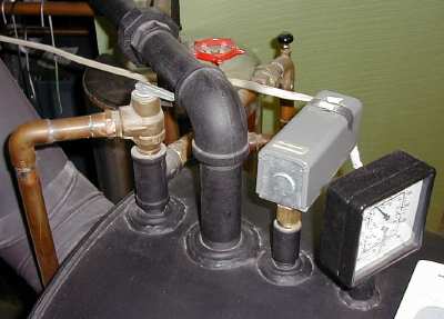 Boiler_top_piping
Left to right, the relief valve, the water outlet, the aquastat, and the temp/pressure gage
Keywords: Boiler