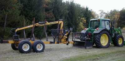 Grapple_loader
Farm tractor size grapple loader for logs
Keywords: Logging_equipment