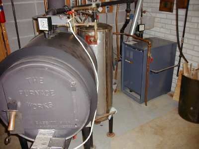 Wood_gas_boiler
Wood boiler with domestic hot pre-heat and gas boiler in background
Keywords: Boiler