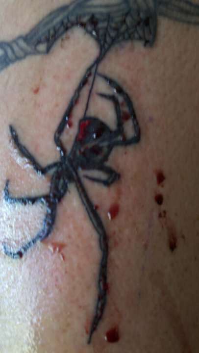 Black widow tattoo
