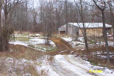 Circle road cut in
Cutting in the road that will go around saw barn
Keywords: OWW barn road