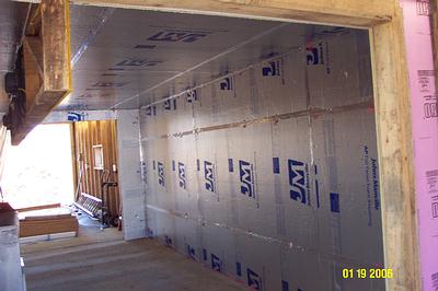 Aluminum taping of celotex in kiln
Aluminum tape applied to celotex in kiln chamber
Keywords: OWW kiln insulation
