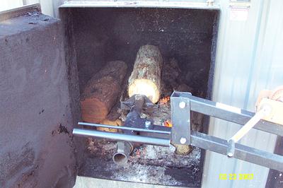 Inserting log with loader
loading furnace
Keywords: OWW loader boiler