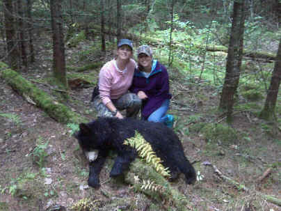 jodys first bear sept 09
this is my daughter in law and grand daughter with a 100 pound sow bear shot in Solon maine.this is my daughter in law first bear.
