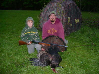 oj and hunter 08
oj,stepson and hunter,grandson with oj first turkey shot at the farm may 08
