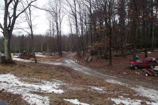 bare ground out back of the house jan 31, 2013
not much snow and warm temps, my woods road is going off into the distance
