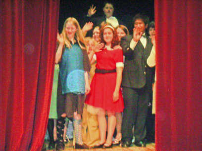 haley in annie play 07
this is my 13 year old grand daughter in the red dress.she was the star of the play annie
