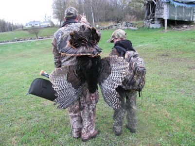 hunter 09 turkey
this is my 10 year old grandson with his first turkey.  5-2-09   9 1/2 beard.1 inch spurs about 20 lbs.
