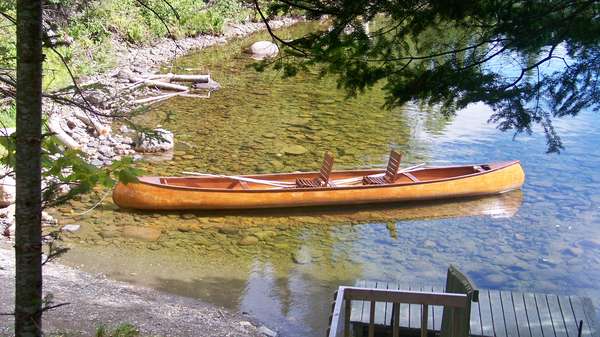 A guides canoe waiting for next sport to come.
