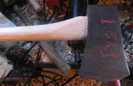 making an axe handle
Axe head on the handle

