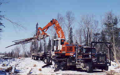 Barko 275B
Loading spruce and balsam , these where cut to make way for new road . Sawlogs if any will be taken out at the yard by slasher .
