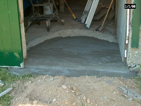 barn door with new cement base
