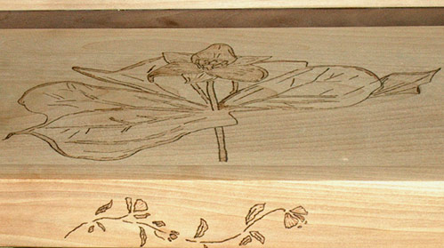 purple trilium wood burn on serving tray with small rose border on side rails
