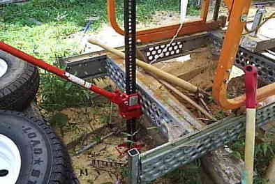 Farm Jack
Farm Jack used to lift bed to remove axle stubs
