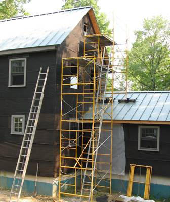 Scaffold set on roof blocking
