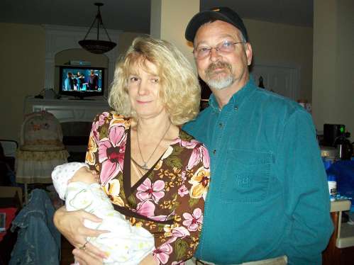 006
Me, my wife, and new grand baby while I weigh 195#
