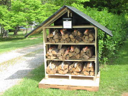 Trying to sell firewood by the driveway for campers.
