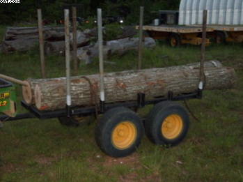 JMS ATV logging trailer with red oak
