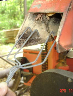 sawdust chute cleaning tool
