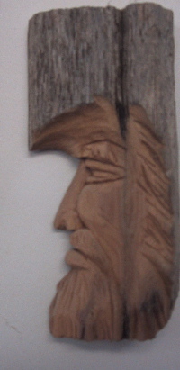 split rail fence carving
Here is a piece of split rail fence I carved.......I cut the profile on the band saw or coping saw, then knock of a flat surface with a flat chisel, pencil in the eye and mouth and carve them out, do a little work on the hair and beard and give it a coat of glaze and a hook at the back for hanging......Approx. time 1/2 hr.
