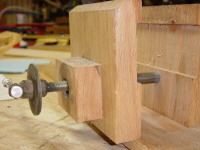 woodvise
view showing front of vise removed showin movable front section and washer with nut welded to each side so that it is "captured" and when screwed to the front vise section, moves the front secton in ond out.
