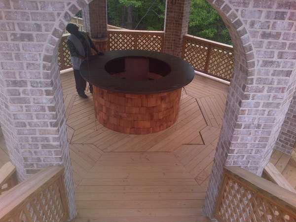 Some of my handywork
Gazebo with hot tub cover/bar in lowered position
