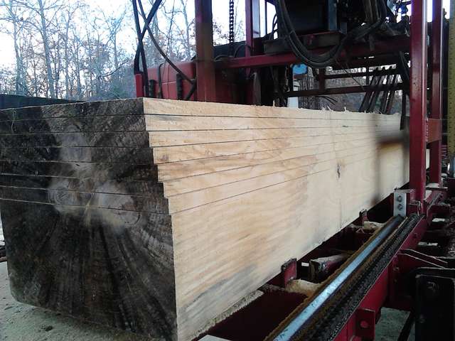 Wide boards
Cut some 16 inch one bys  12 feet long---got 15 plus the smaller stuff out of this log
