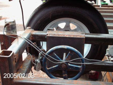 Idler side
Winch tension and threaded rod with wheel handle for tracking adjustment
Keywords: Idle side