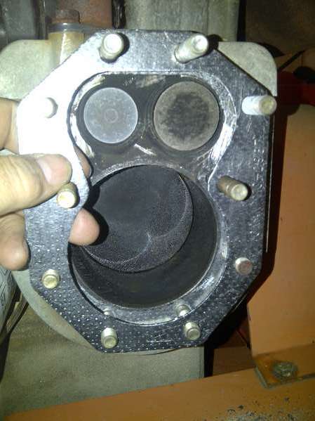 Onan 24HP head gasket replacement
new_gasket_fitted_over_studs 
