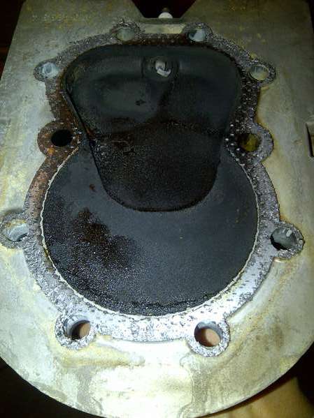 Onan 24HP head gasket replacement
clean_the_head 
