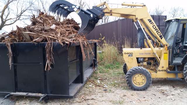 cedar bark - loading dumpster bins

