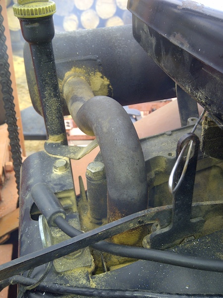Exhaust pipe on Onan 24hp.
Hey, what's with the sawdust?
