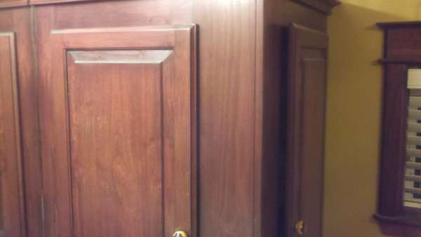 Alder cabinets with a dark cherry stain
